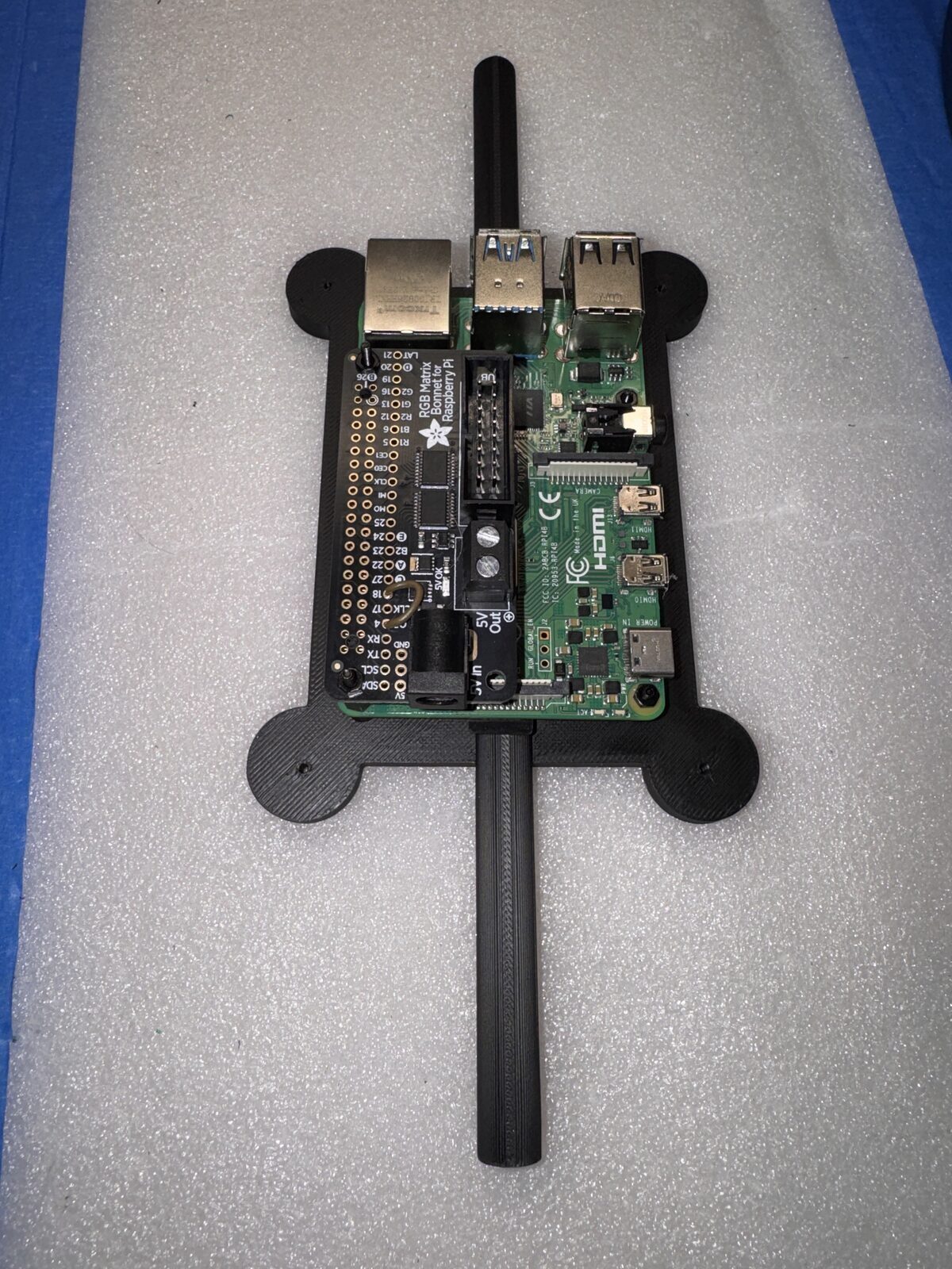 Raspberry Pi mount designed to clamp to the LED cube support rod