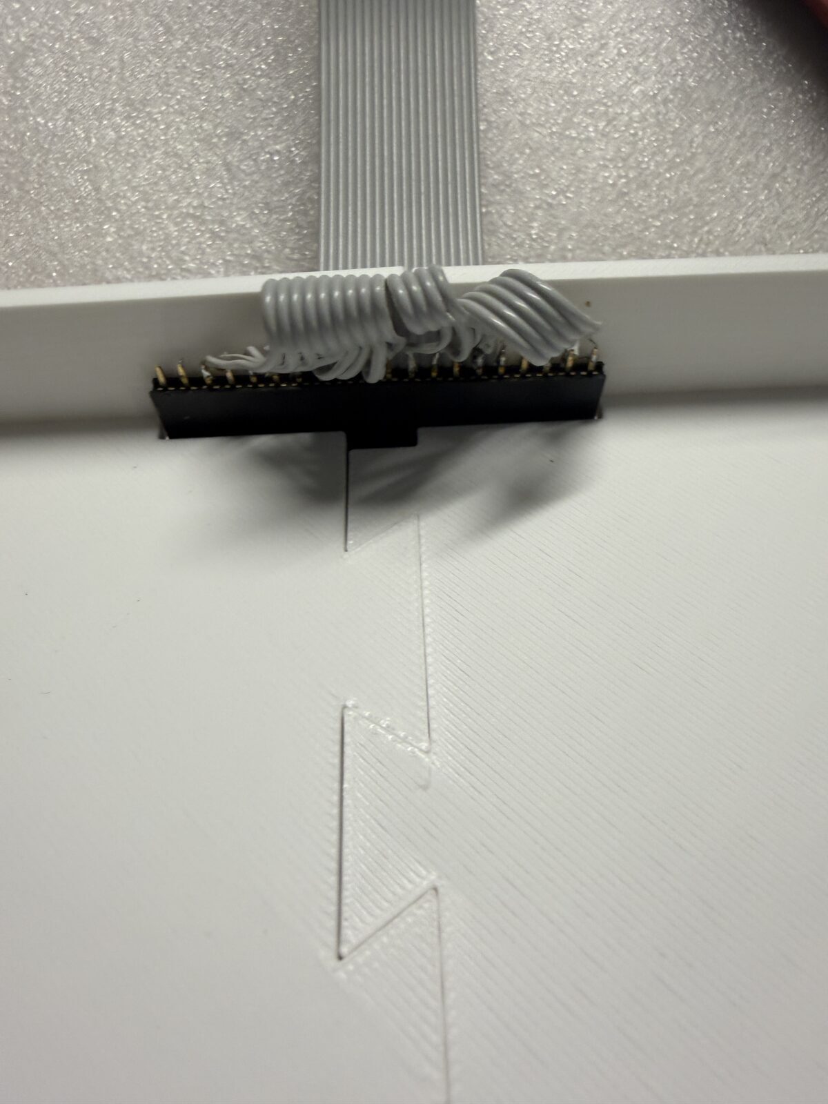 Connected to posts on keyboard through the 3D printed base.