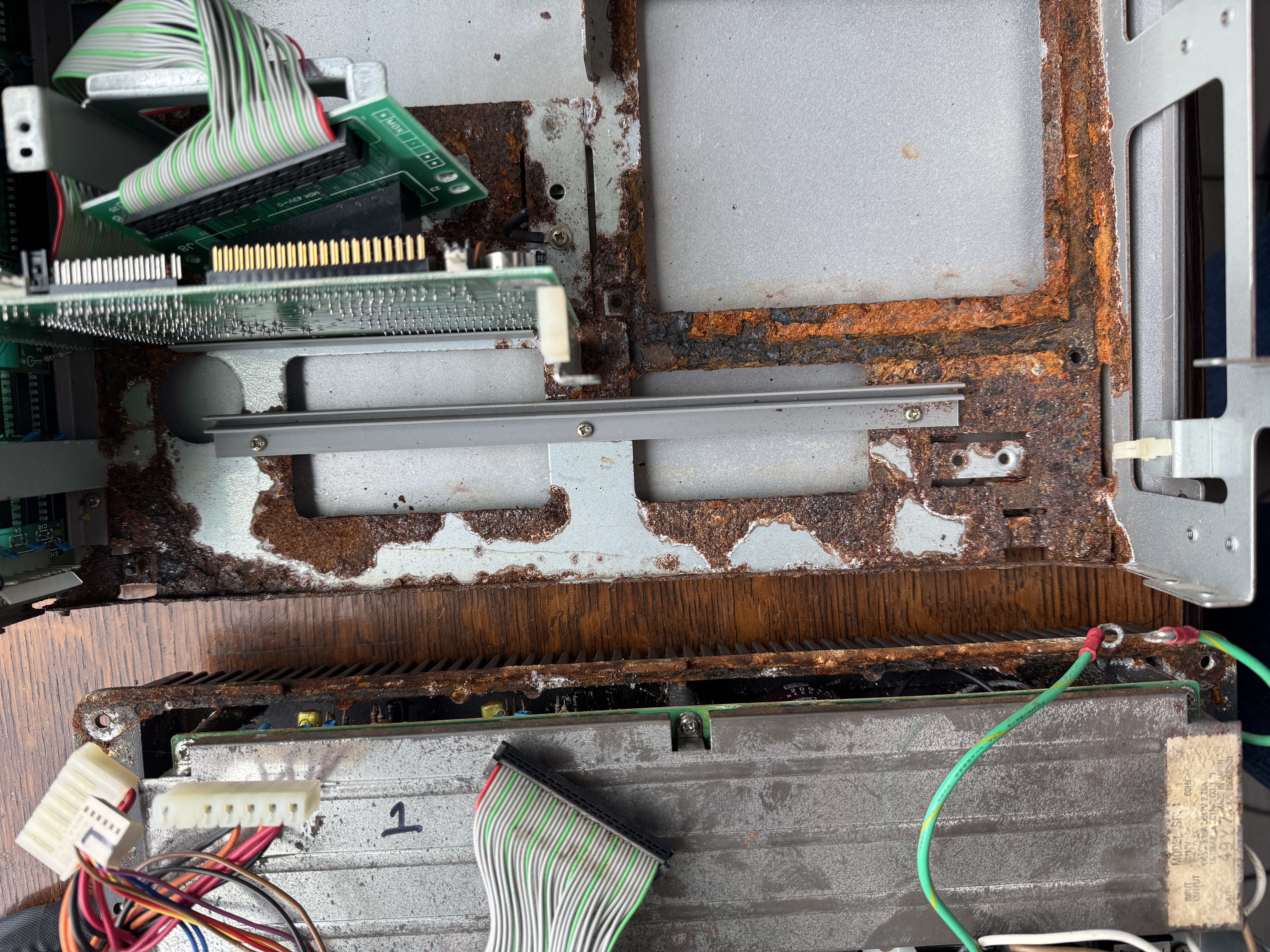 Closeup of chassis and power supply damage